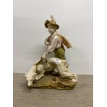 A large Royal Dux porcelain figure of a boy with a dog. Tail missing and small chip to hat.