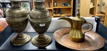 A pair of 19th century hammered and engraved Persian brass vases, H. 37cm. Together with an