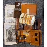 A group of gentlemen's travelling sets and prints.