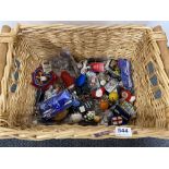 A basket of mixed football and other keyrings.