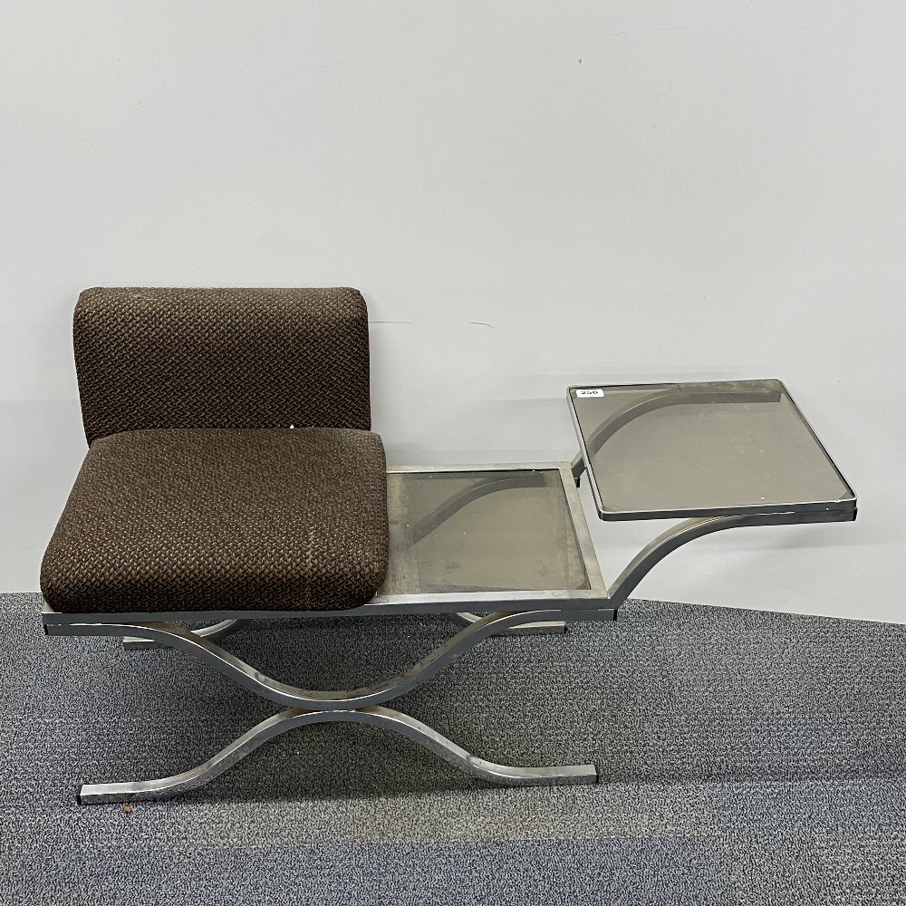A 1970's chrome and smoked glass hall seat, W. 104cm.