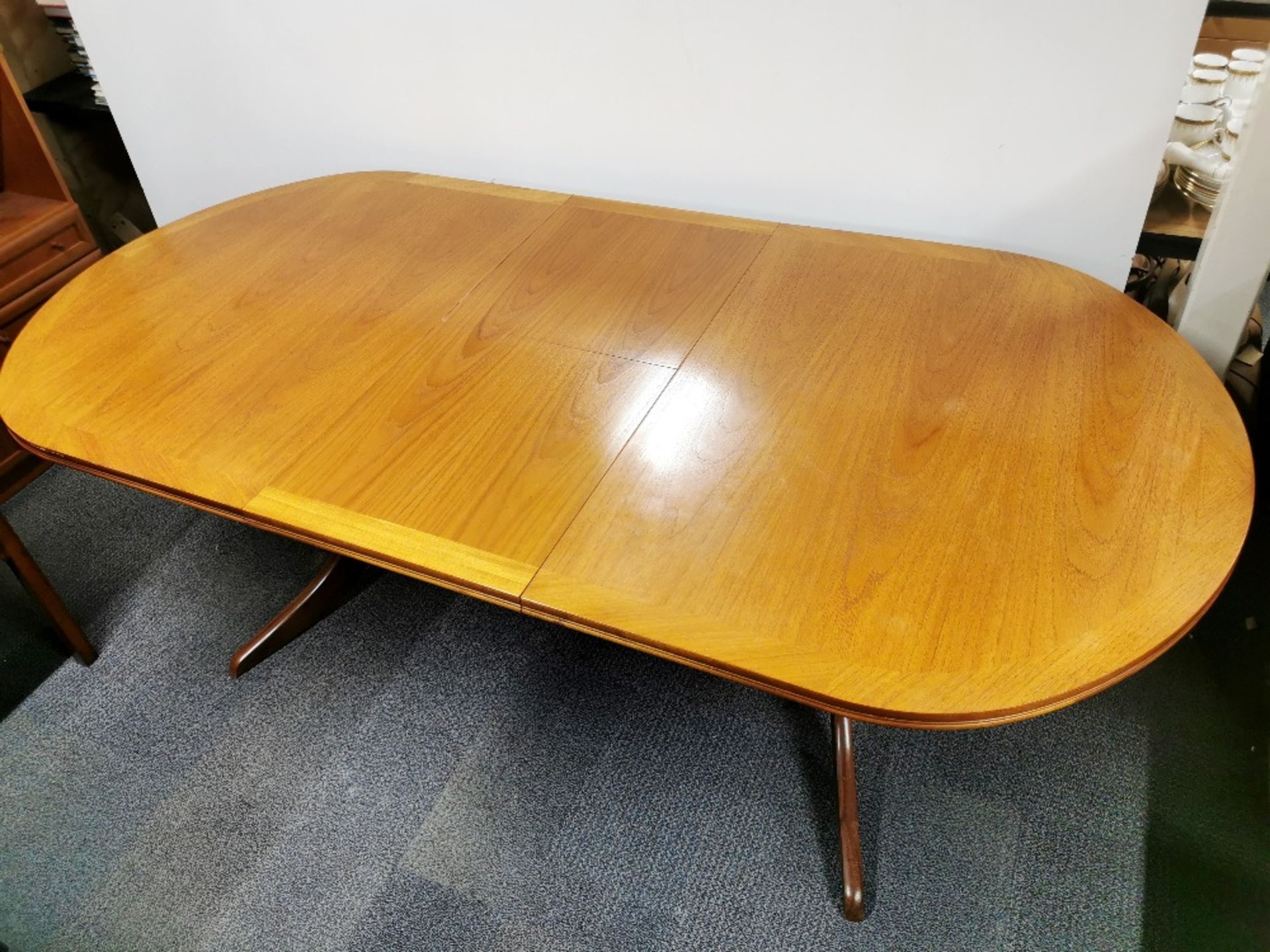 A 1970's Nathan extending teak dining table, H. 73.5cm, W. 104cm. Unextended L. 164cm, extended L. - Image 8 of 8