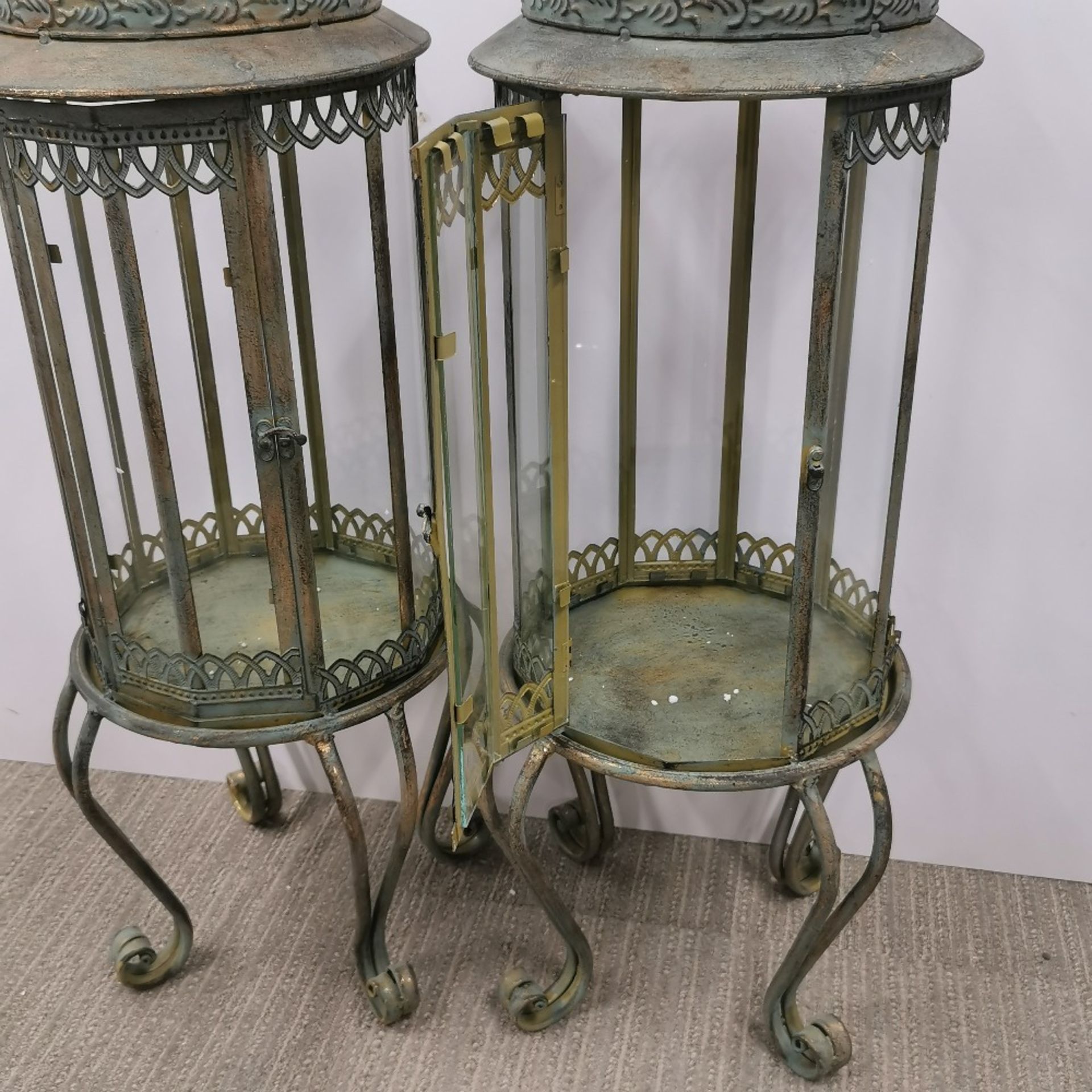 A pair of metal and glass garden storm lanterns, H. 80cm. - Image 3 of 3