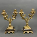 A pair of gilt bronze and marble cherub candelabra, H. 27cm.