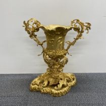 A gilt bronze Rococo style urn H. 51cm.