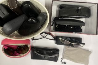 A quantity of mixed vintage sunglasses and cases.