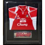 A framed Thailand National football team shirt and team photograph, frame size 86 x 91cm.