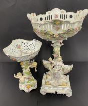 Two 19th century continental porcelain center pieces, tallest H. 50cm. Some restoration to larger