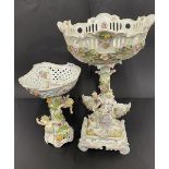 Two 19th century continental porcelain center pieces, tallest H. 50cm. Some restoration to larger