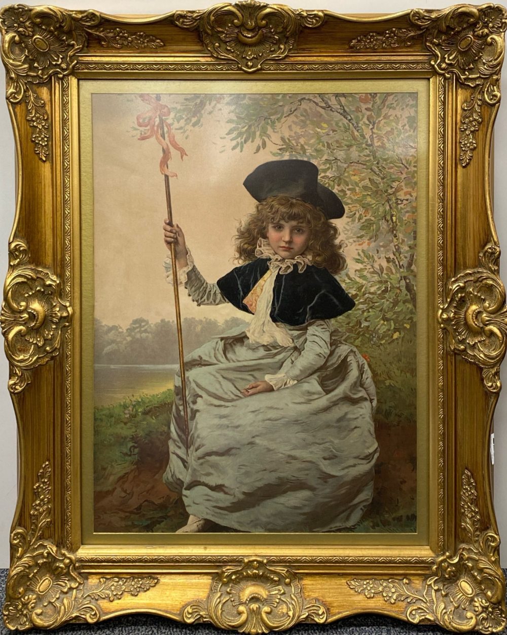 A gilt framed Victorian print of a girl, frame size 62 x 76cm.