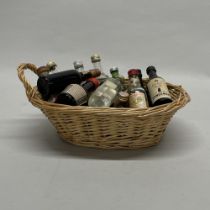 A basket of mixed alcohol miniatures.