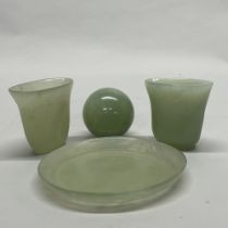 A Chinese jade / hardstone tray with two wine cups and a ball, Dia. 12cm.