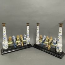 A pair of ormolu mounted porcelain budgerigar candlesticks, W. 35cm.
