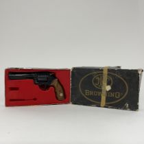 A boxed Browning replica revolver.