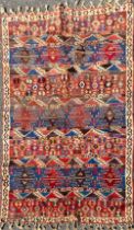 An antique hand woven Eastern rug, 134 x 200cm.