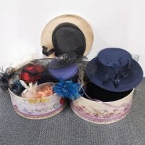 A quantity of vintage ladies hats.