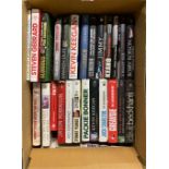 A box of football related biographies.