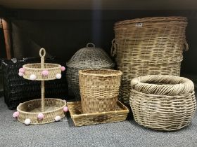 A quantity of hand woven baskets, largest H. 52cm.