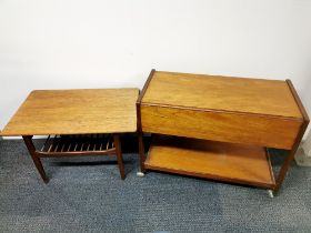 A mid 20thC teak coffee table, together with a further mid century teak drop leaf tea trolley, H.