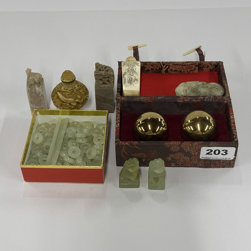 A group of mixed Chinese items including snuff bottles, seals and jade beads (probably from an