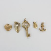 A mixed group of 9ct yellow gold pendants, longest L. 3.5cm.