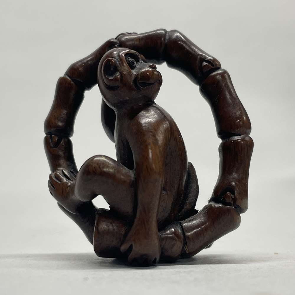 A Chinese craved wooden netsuke of a resting crane, together with a further carved wooden netsuke of - Image 3 of 3