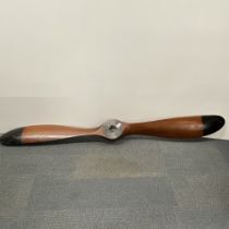 A full sized decorative hardwood propeller, L. 196cm.