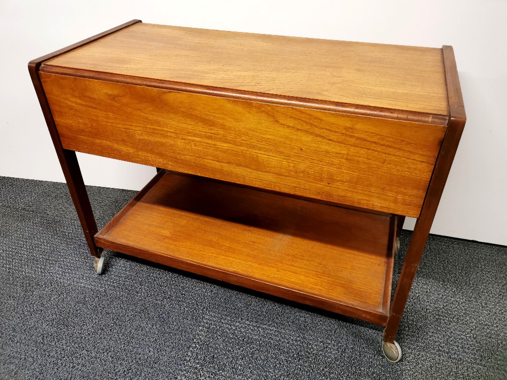 A mid 20thC teak coffee table, together with a further mid century teak drop leaf tea trolley, H. - Image 4 of 5