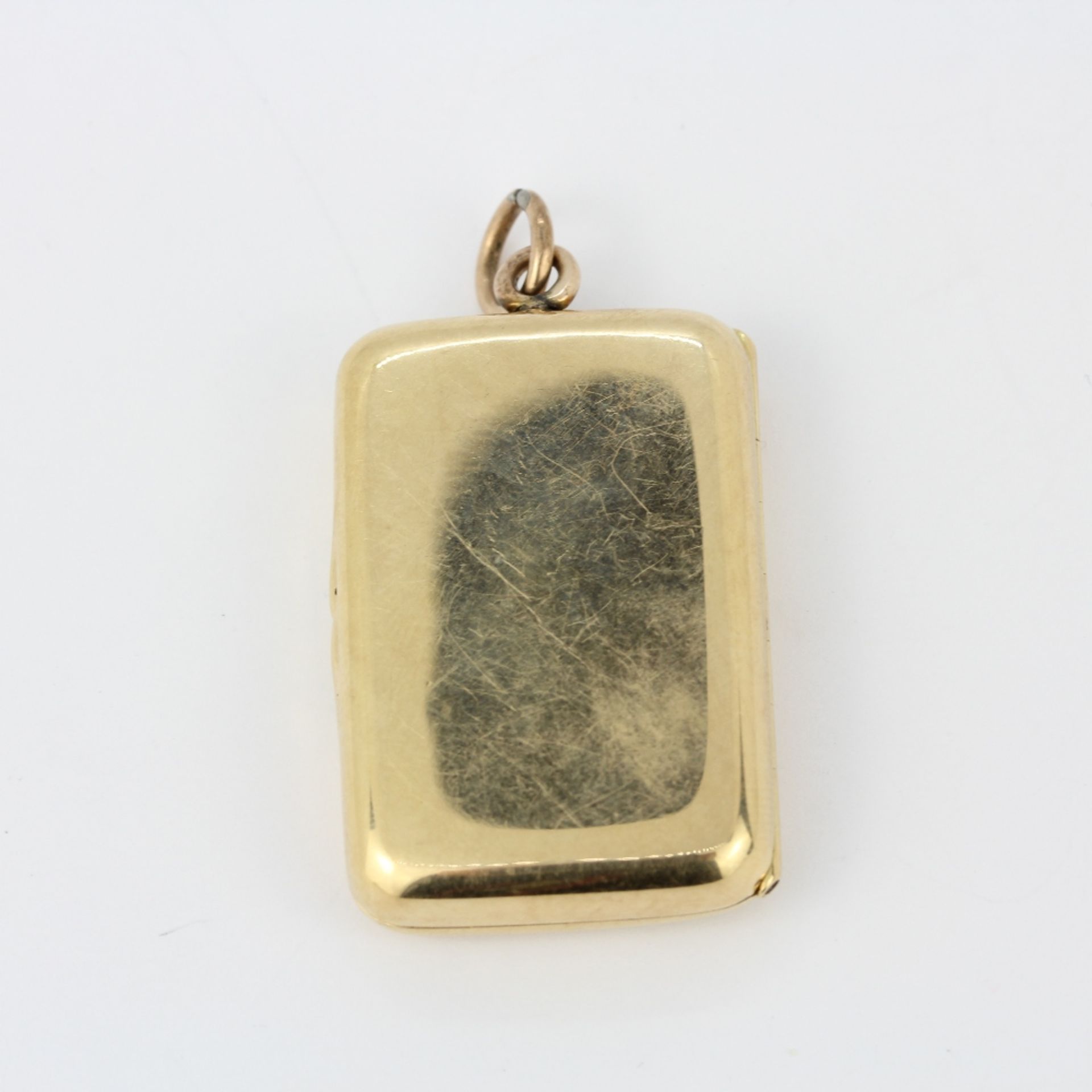 A heavy 14ct yellow gold (tested) locket pendant, L. 4.5cm.