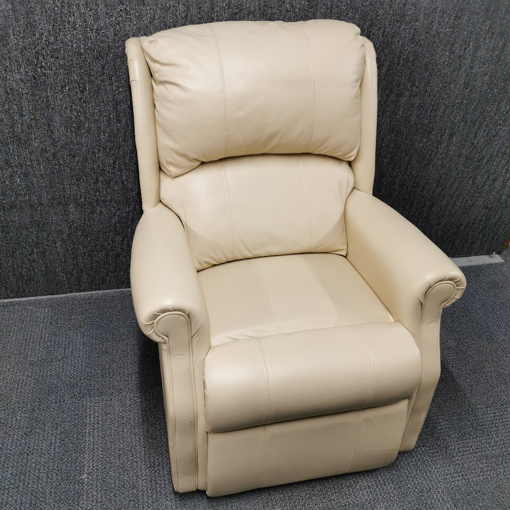 A large cream leather armchair, H. 107cm.