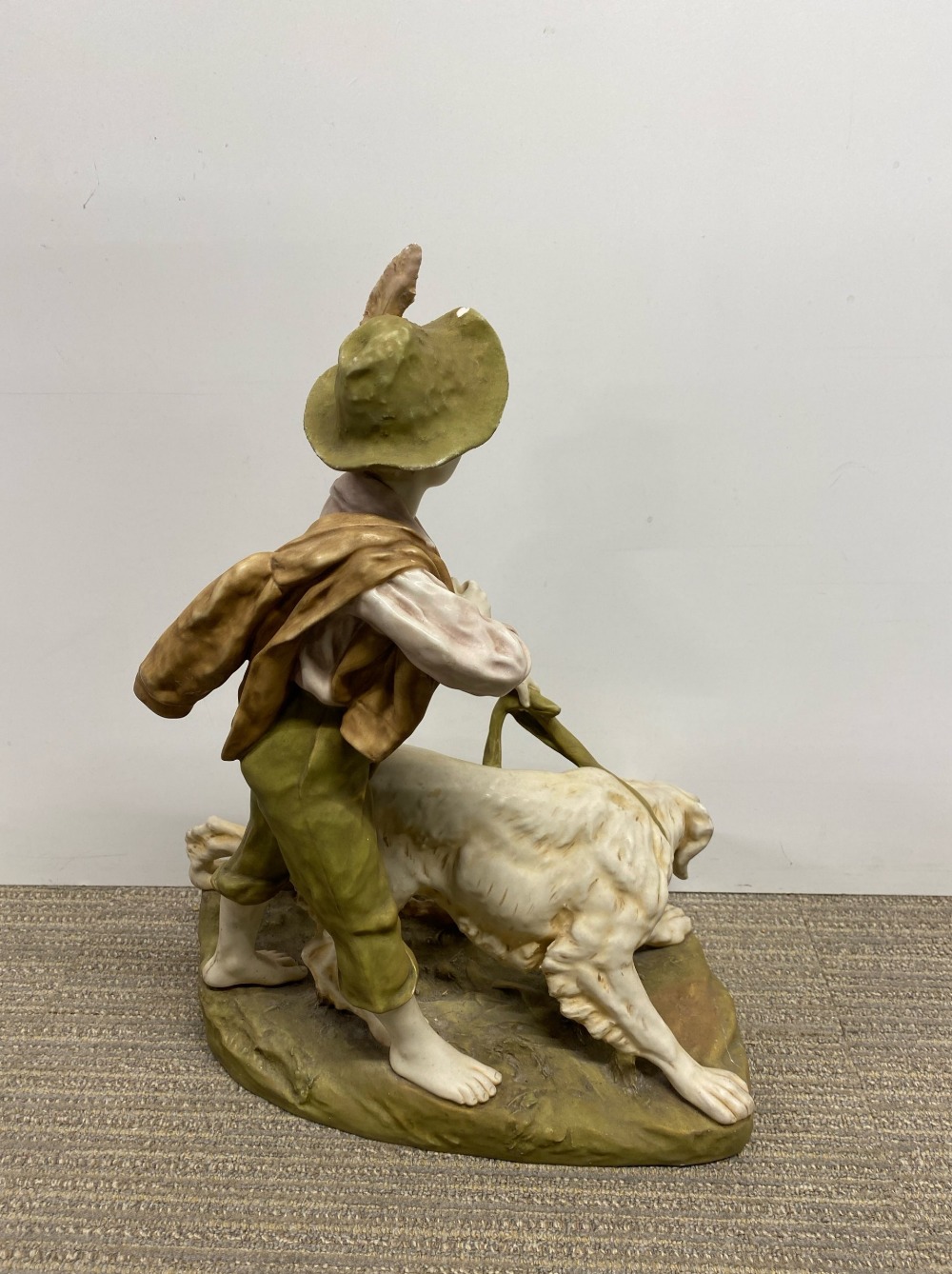 A large Royal Dux porcelain figure of a boy with a dog. Tail missing and small chip to hat. - Image 3 of 3