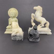 A group of three Chinese carved stone figures and 1 moulded coal, tallest T. 17.5cm.