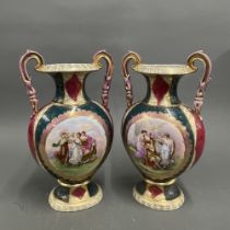A pair of 19th century Continental porcelain vases after Angelica Kauffman, H. 38cm.