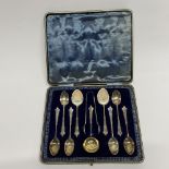 A lovely cased hallmarked silver teaspoon and serving set.