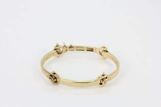 A heavy yellow metal (tested minimum 9ct gold) bracelet, inner L. 5.5cm.