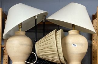A pair of pottery and painted metal table lamps and shades, tallest H. 50cm.
