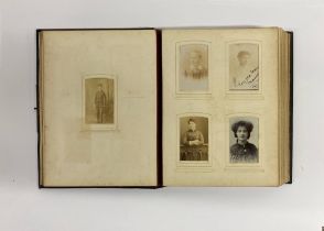 A Victorian leather photograph album.