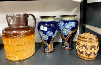 A pair of Royal Doulton Lambeth stoneware vases together with a further Douton Lambeth jar and lid