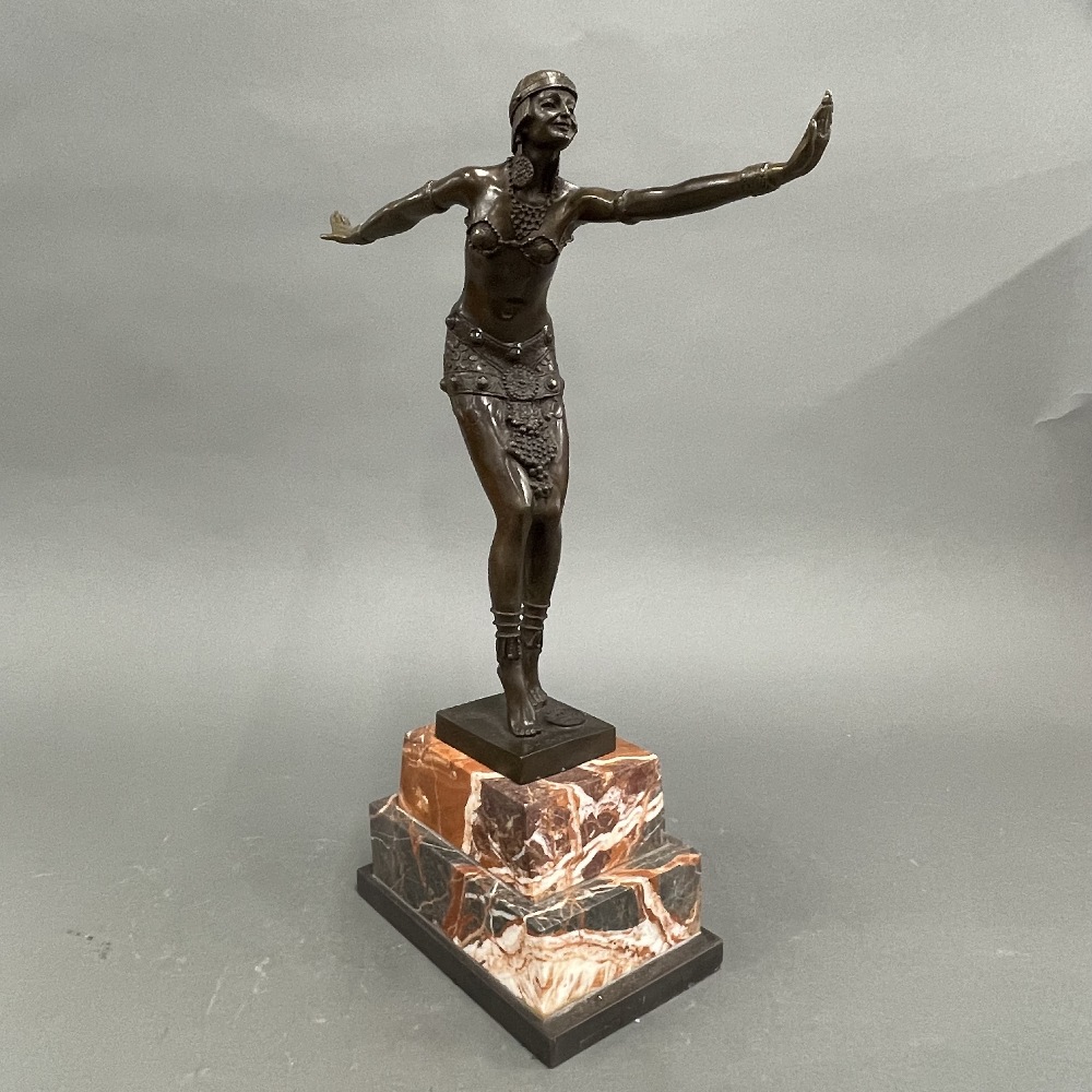 A large Art Deco style bronze figure of a dancer on a marble base, H. 46cm.