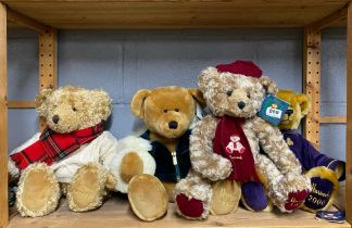 A group of four Harrods Year Bears.