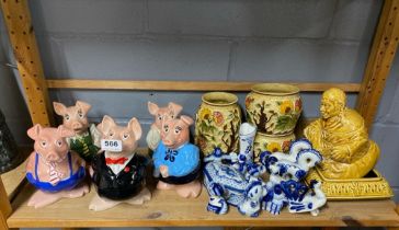 A set of Wade Natwest pigs, with Russian figures and other items.