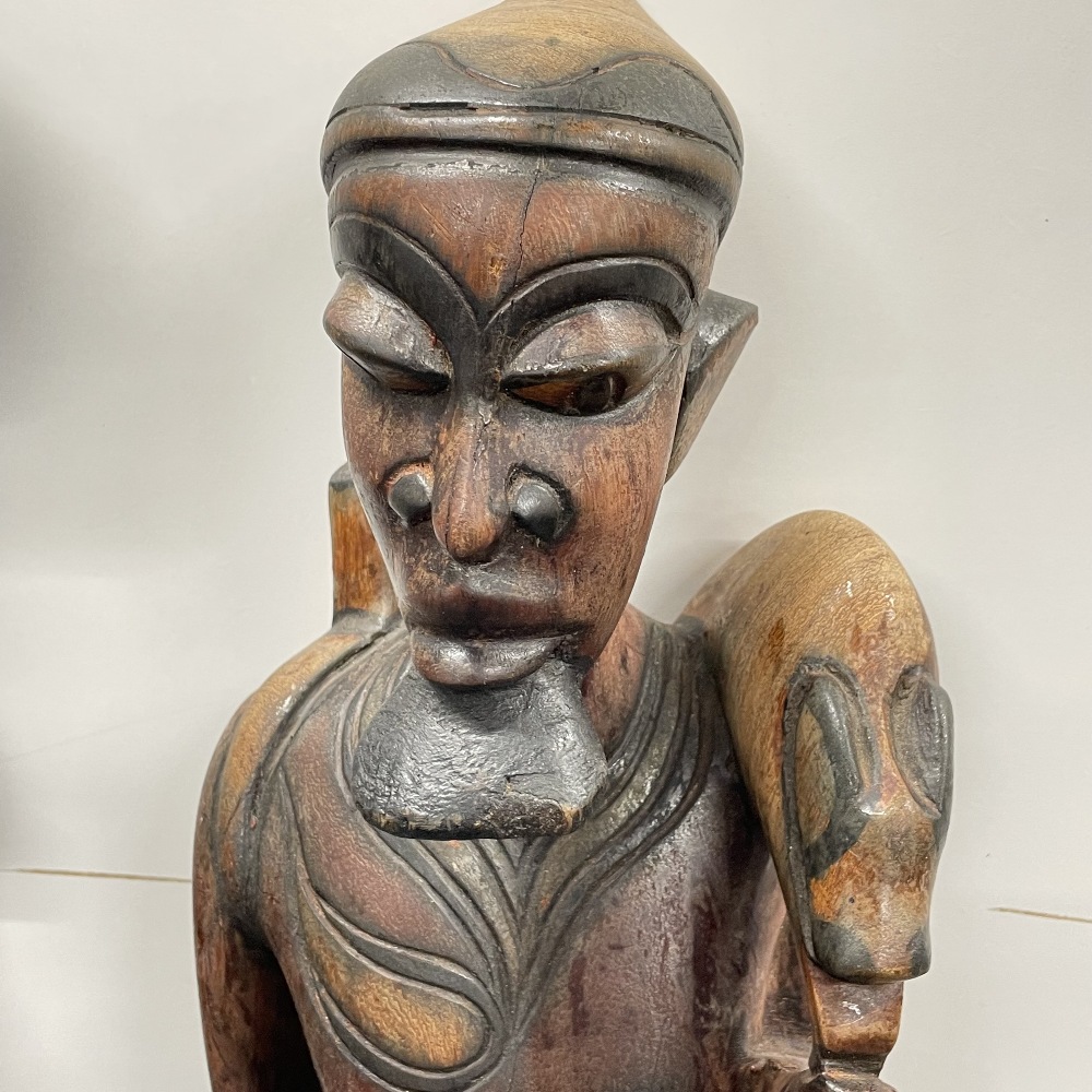 Two large African carved wooden figures with a wooden spear, figure H. 78cm. - Image 2 of 6