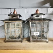 A pair of Pagoda style storm lanterns, H. 30cm.