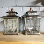 A pair of Pagoda style storm lanterns, H. 30cm.