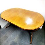 A 1970's Nathan extending teak dining table, H. 73.5cm, W. 104cm. Unextended L. 164cm, extended L.