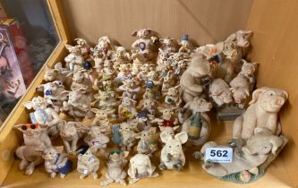 A quantity of Piggin figures.