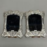 A pair of hallmarked silver mounted photo frames, 15 x 19.5cm.