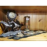 A Welsh miner's lamp, a group of horse brasses and a racehorse clock, clock H. 30cm.