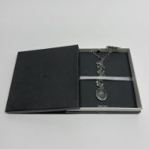 A boxed Waterford crystal and sterling silver necklace.