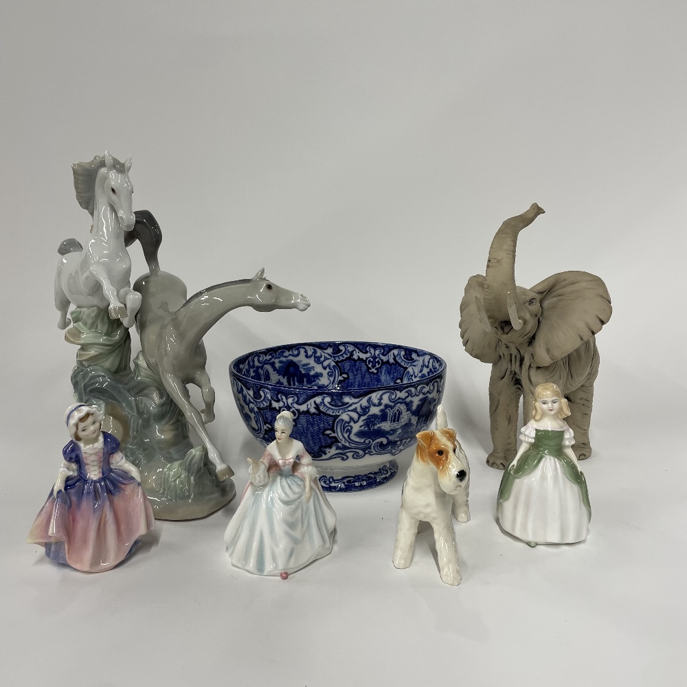 A Lladro figure of two horses (one foreleg A/F). Together with a Beswick dog, three small Royal